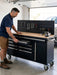 61 inch rolling tool chest with workbench and 10 drawers in a garage