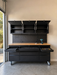 72 inch tool cabinet in a NZ garage with the three overhead cabinets and drawers open, tools laid out on the rubberwood top